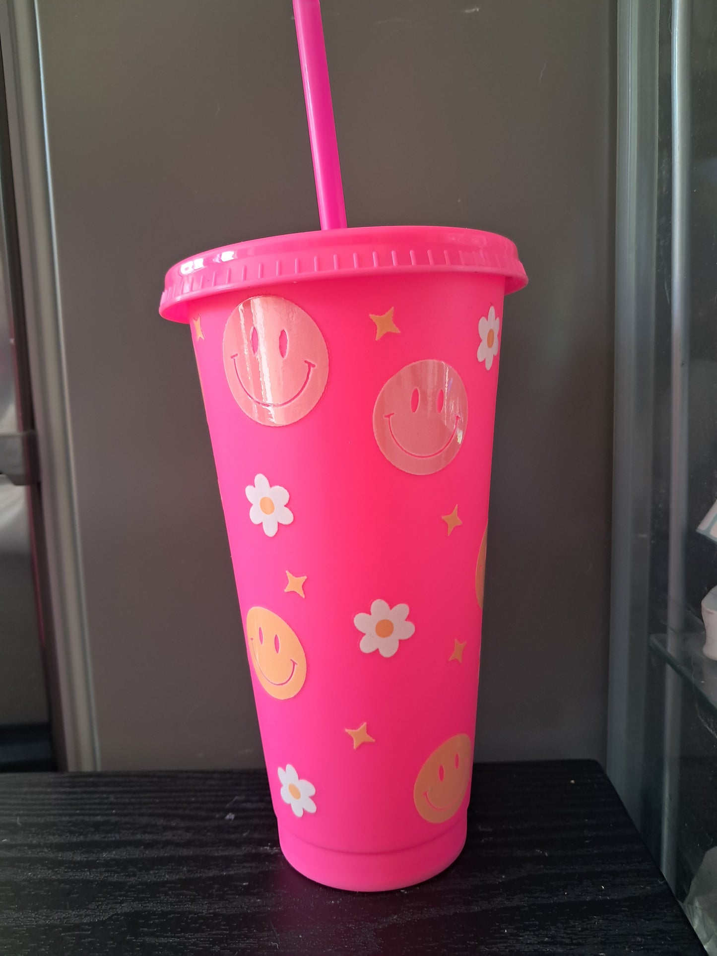 Face and flowers cold cup