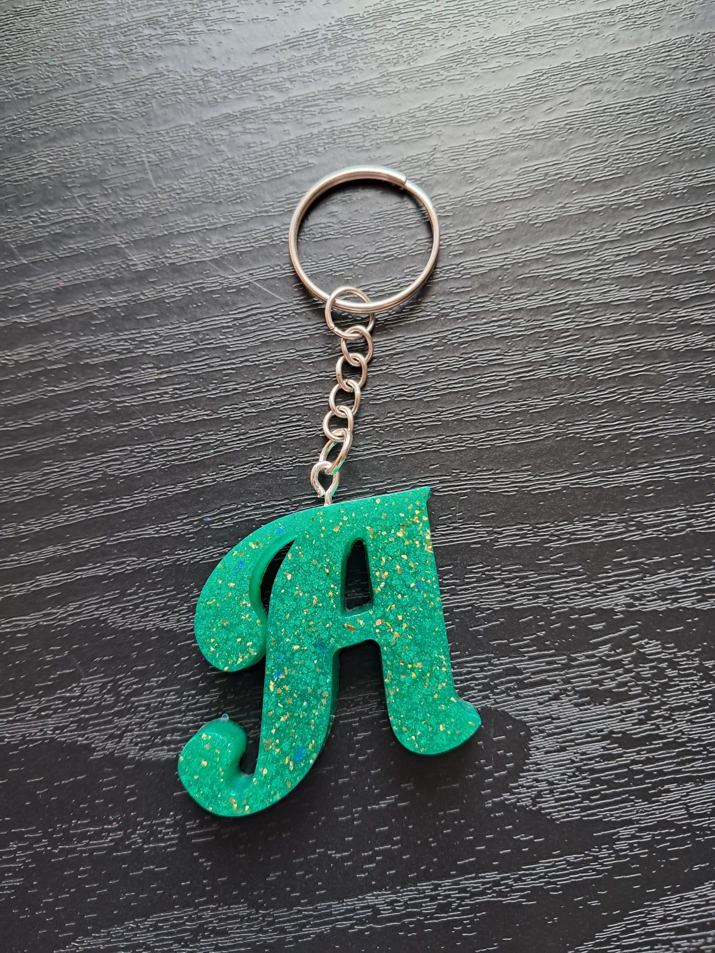 A resin  initial keyring