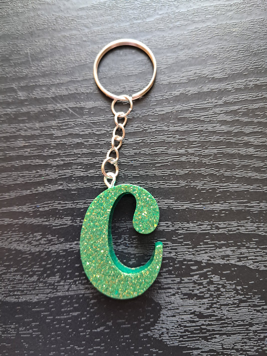 C resin  initial keyring