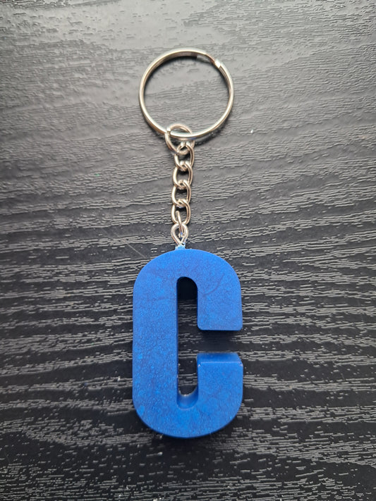 C resin  initial keyring